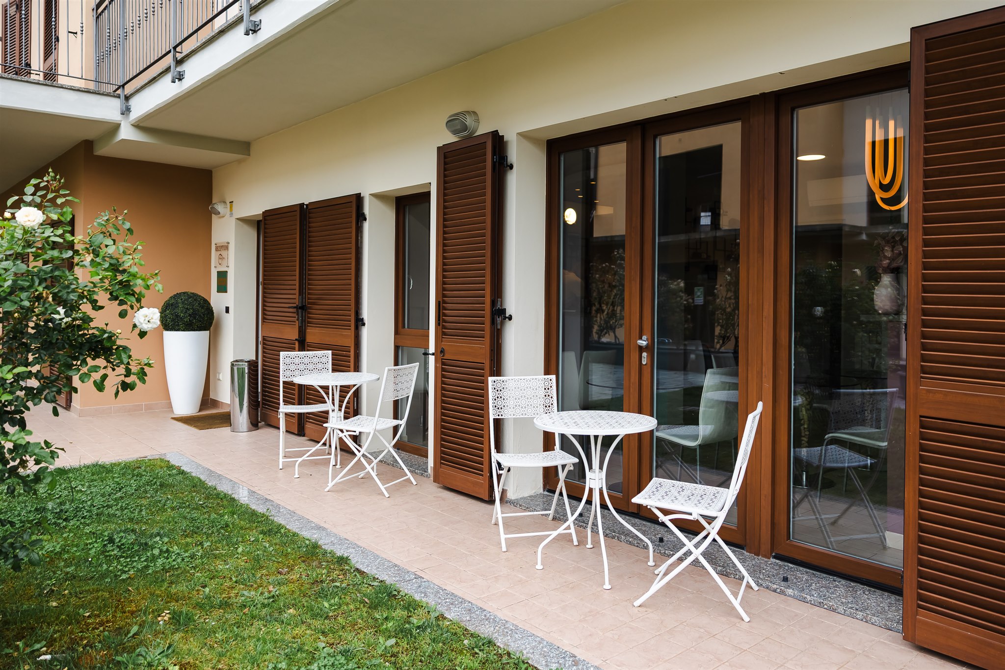 Our terraces in the green — Hotel RossoVino Como